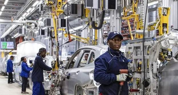 Nigerian Workers in a Manufacturing Plant | Source: Ripples Nigeria